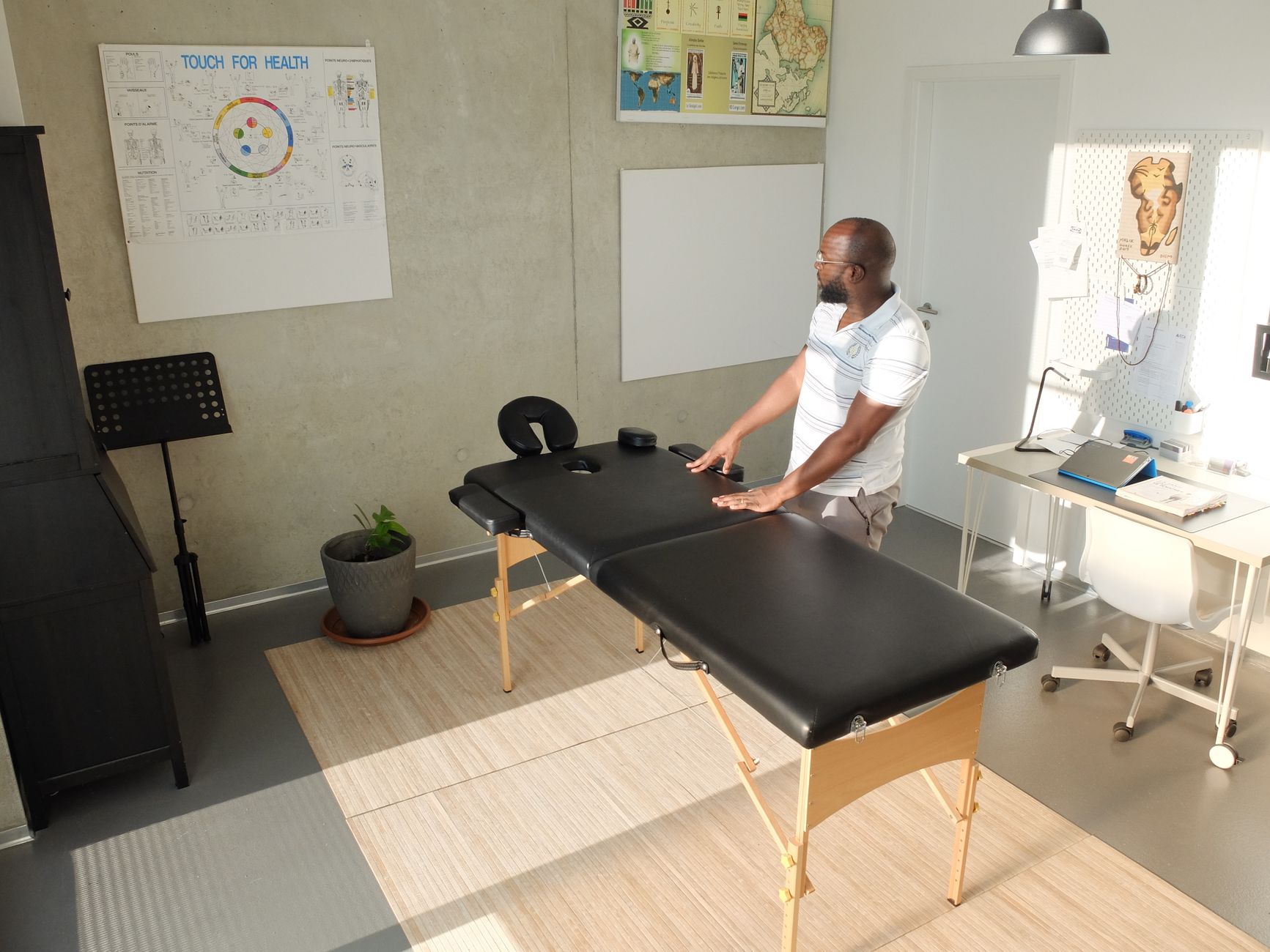 Treatment table and chairs in a light room